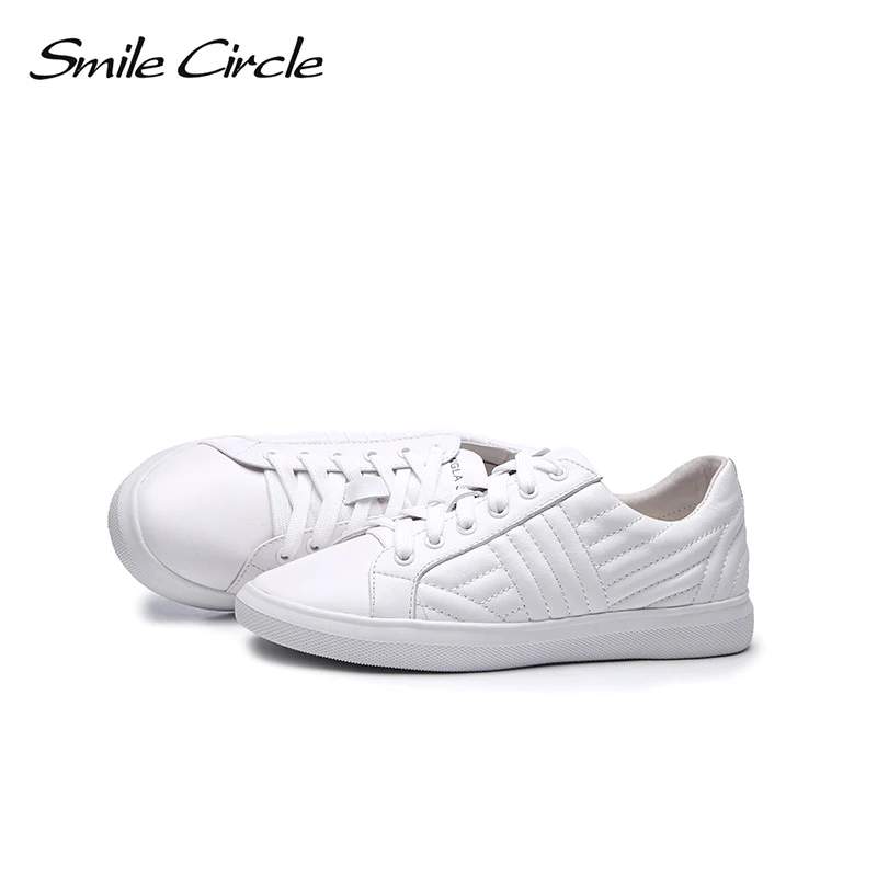 Женские кроссовки Smile Circle белые и черные из натуральной кожи на плоской подошве