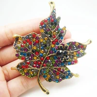 vintage multi color rhinestone crystal maple leaf woman brooch pin gold tone