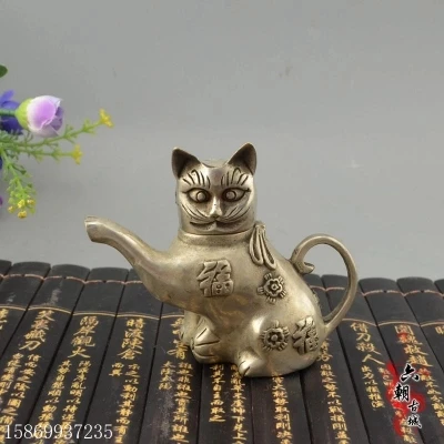 

Antique bronzes long mouthed cat handheld pots ornaments handicrafts