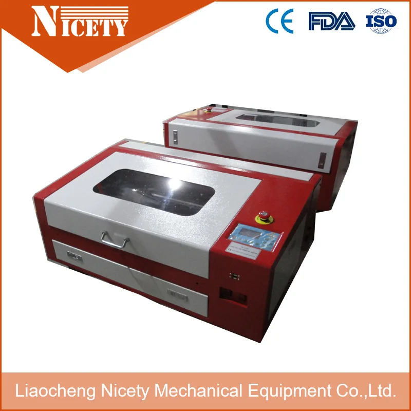 60 Вт МДФ Лазерная резка машина с Авто вверх и вниз сотовой рабочий стол |