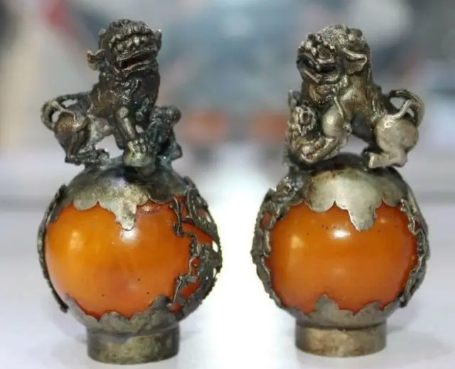 A Pair of Old Tibet Silver Hand Carved Amber Dragon Phoenix Ball Lion Statues