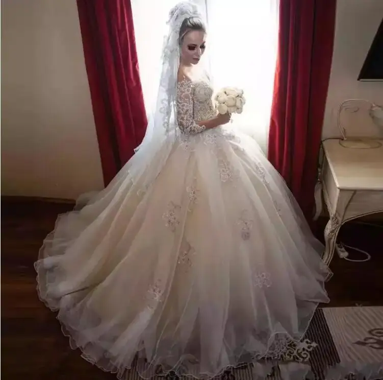 

Beautiful Ball Gown Wedding Dresses Long Sleeve Jewel Neck Tulle Lace sweep train Bridal Gown Vestidos De Novia wedding gowns