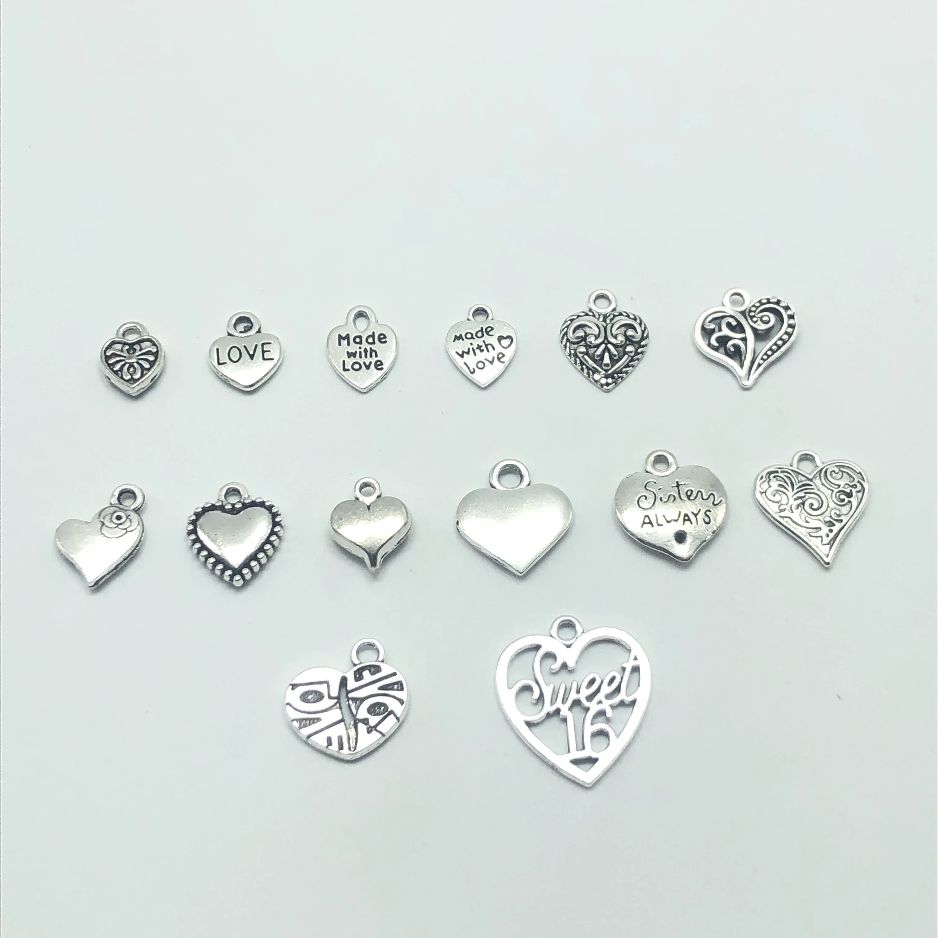 ДжунКанг 30 штук Разнообразная серия сплавных тибетских серебряных сердец для ювелирных изделий-амулетов классических модных находок DIY.