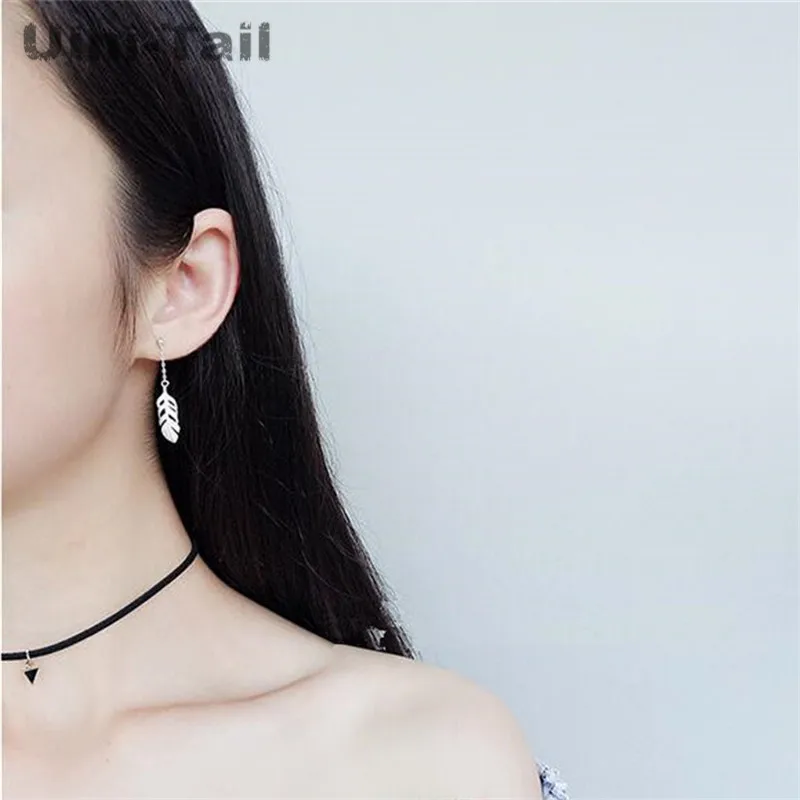 

Hot 925 sterling silver Korean sweet feather long earring temperament simple personality short paragraph earring earrings
