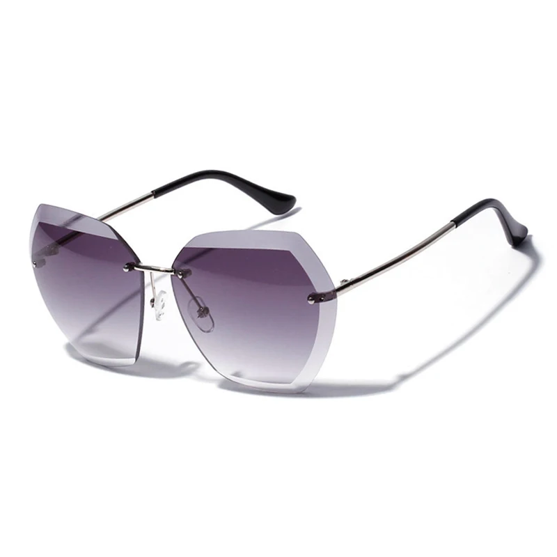 Популярные высококачественные женские солнцезащитные очки без оправы в стиле