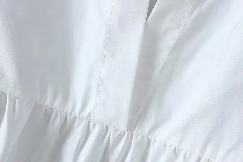 Женское свободное платье-трапеция с асимметричным подолом однотонное