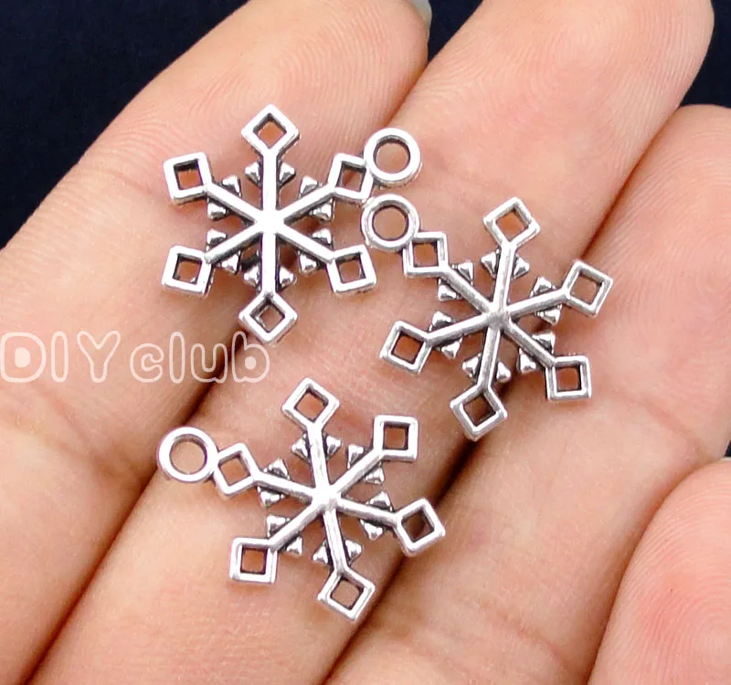 100pcs-Antique серебро очаровательные снежинки на Рождество кулон 2-сторонний 20x15 мм |