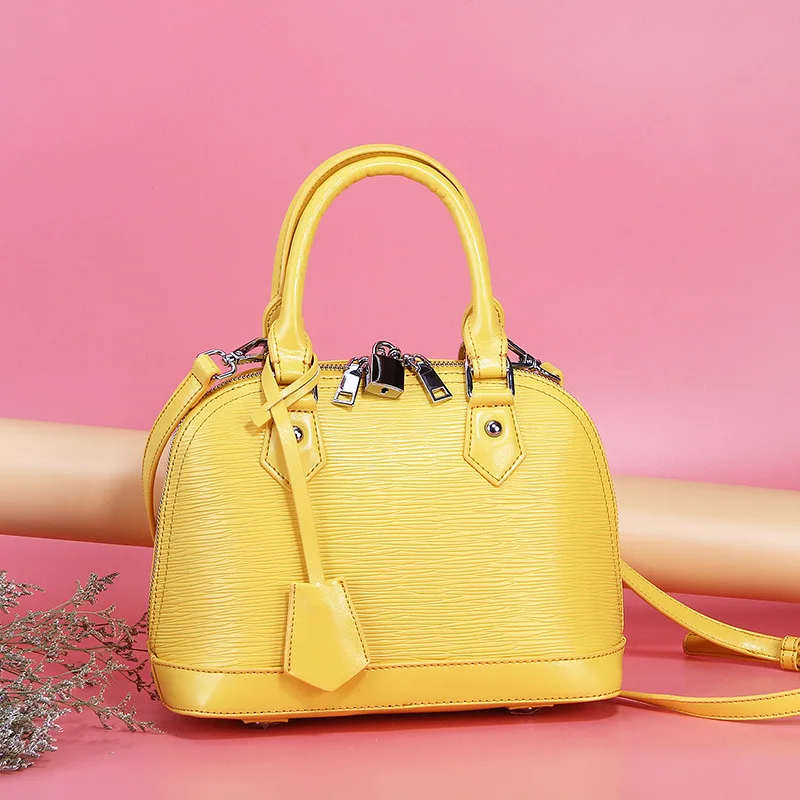 New Cowhide Female Entrapment Signature Shell cow Leather Female Packets Shoulder Hand Strap Bag