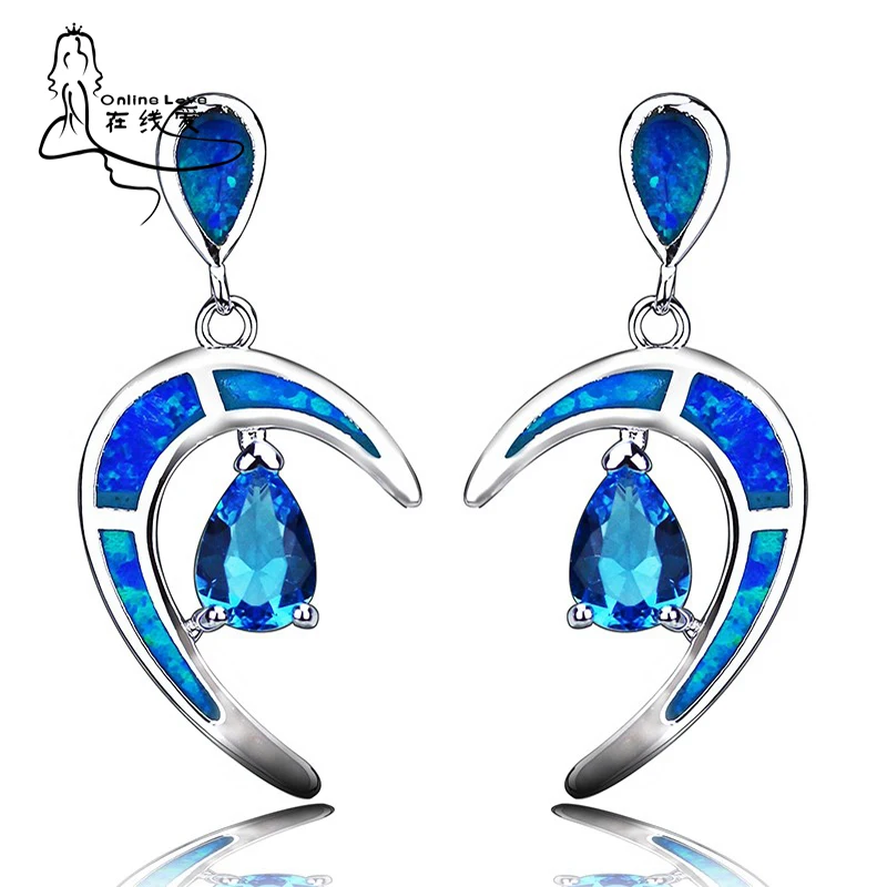 Великолепные серьги-подвески в форме Луны с голубым кристаллом и опалом