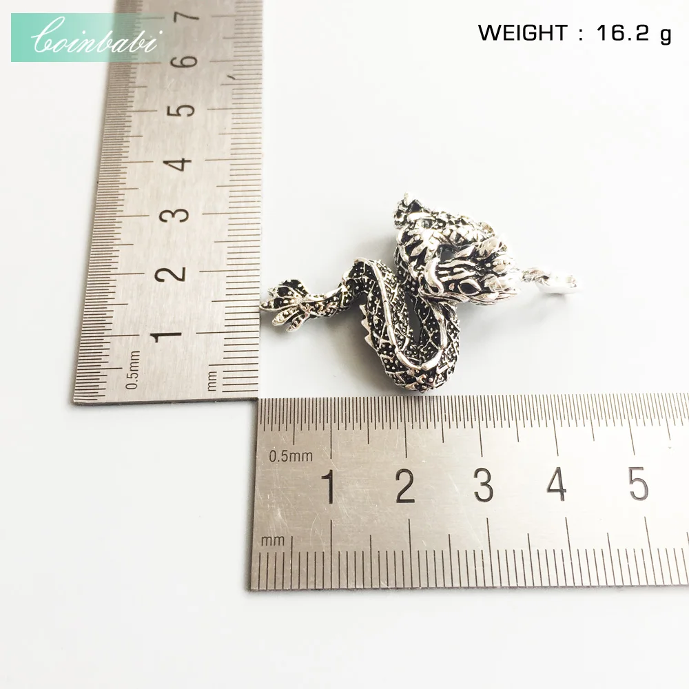 Подвеска с изображением мифического дракона серебряный черный размер 3 5 см для