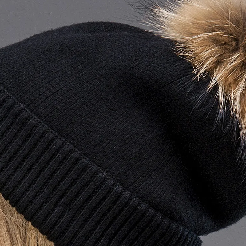 

2017 Hot The wool knitted hat spring autumn warm earmuff two types of wear woman's cap with real raccoon fur Pompom on the top