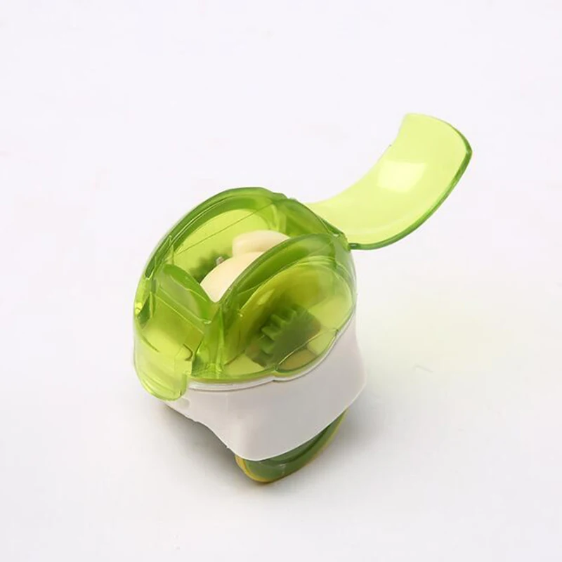 TAOXIBEI Mini Plastic Rolling Garlic Cutter Press Grater Spice Chopper Kitchen Cooking Tools Home Gadgets | Дом и сад