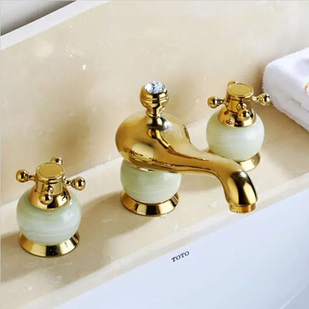 

Новое поступление, модный роскошный высококачественный смеситель из латуни и нефрита, позолоченный, с кристальной ручкой, широкий смесител...