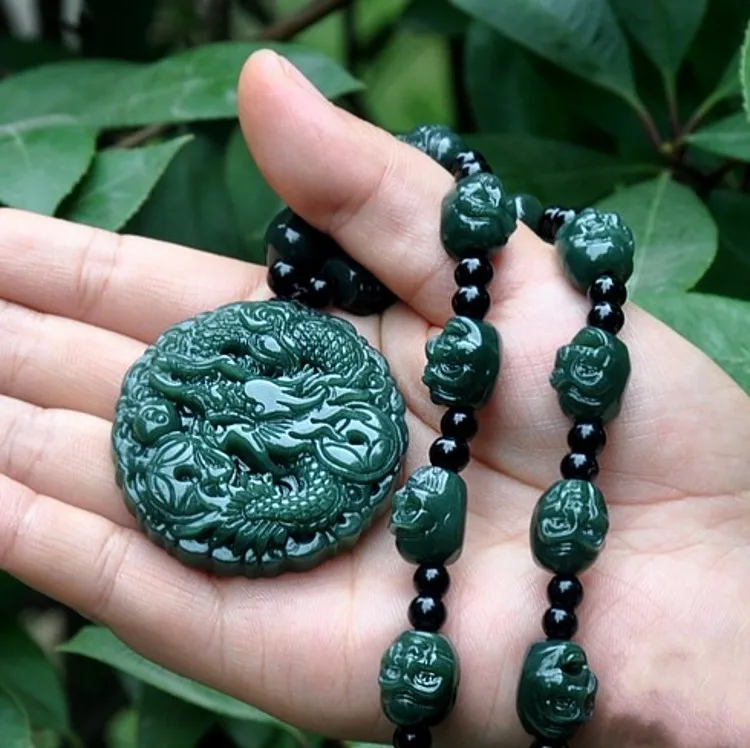 

Xinjiang hetian jade zodiac dragon pearl 18 arhats necklace pendant dragon play