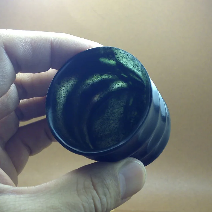 

Natural ink green jade slub shape teacup / wine glass.