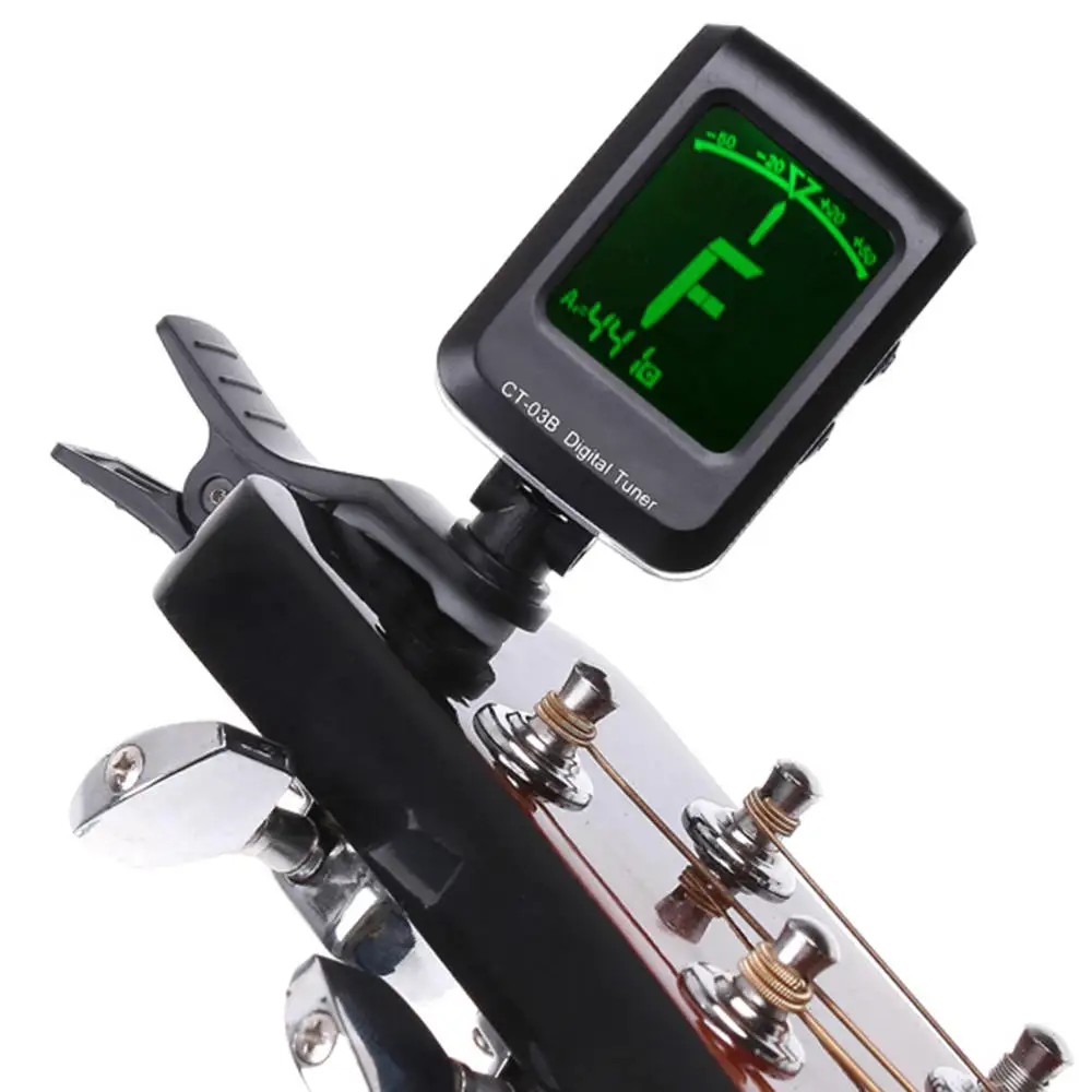 

CT-03B Electronic Guitar Tuner Digital LCD Screen Clip-On Tuner for Guitar Chromatic Bass Ukulele C / D Violin