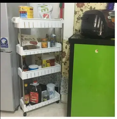 

The refrigerator is stitched into the kitchen shelves and the rack can be moved