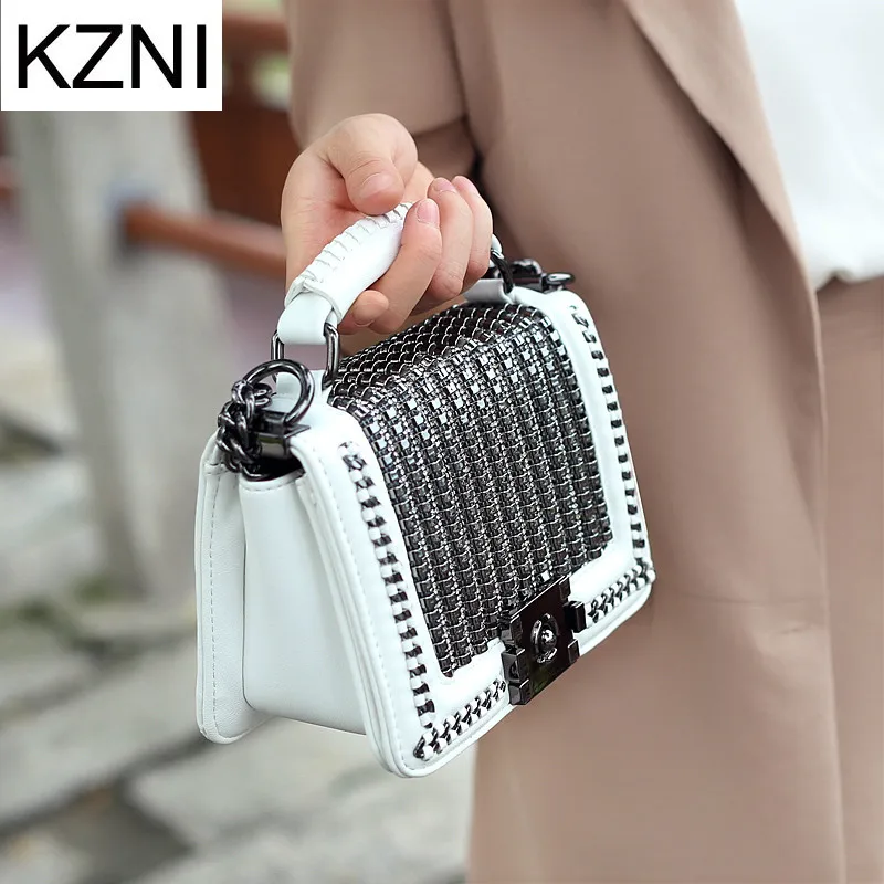 Женская сумка-мессенджер KZNI из натуральной кожи с цепочкой и заклепками на лето