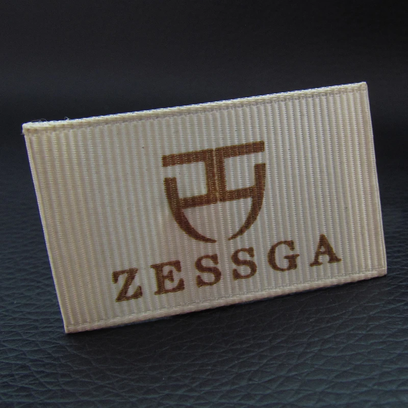 Индивидуальные этикетки для одежды пришитые тканевые и бирки печати тканые