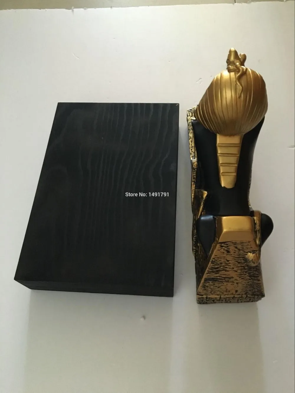 Поместите статую Сфинкса гизы на заднюю стенку чтобы открыть замок Египет