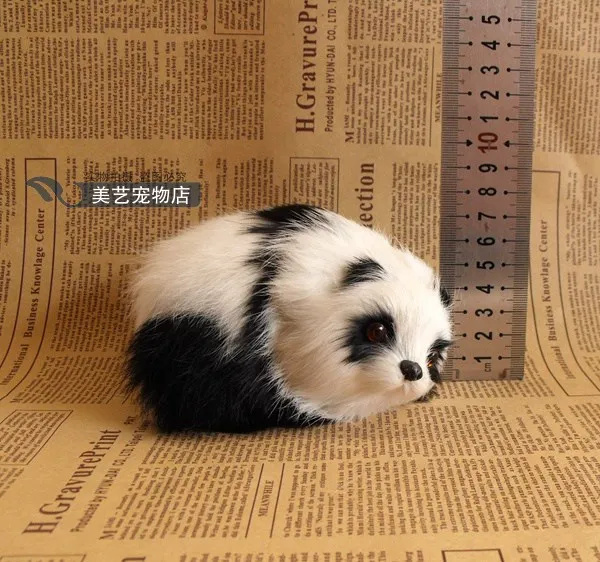 

cute simulation lying panda toy lifelike mini panda doll gift about 12x6x9cm