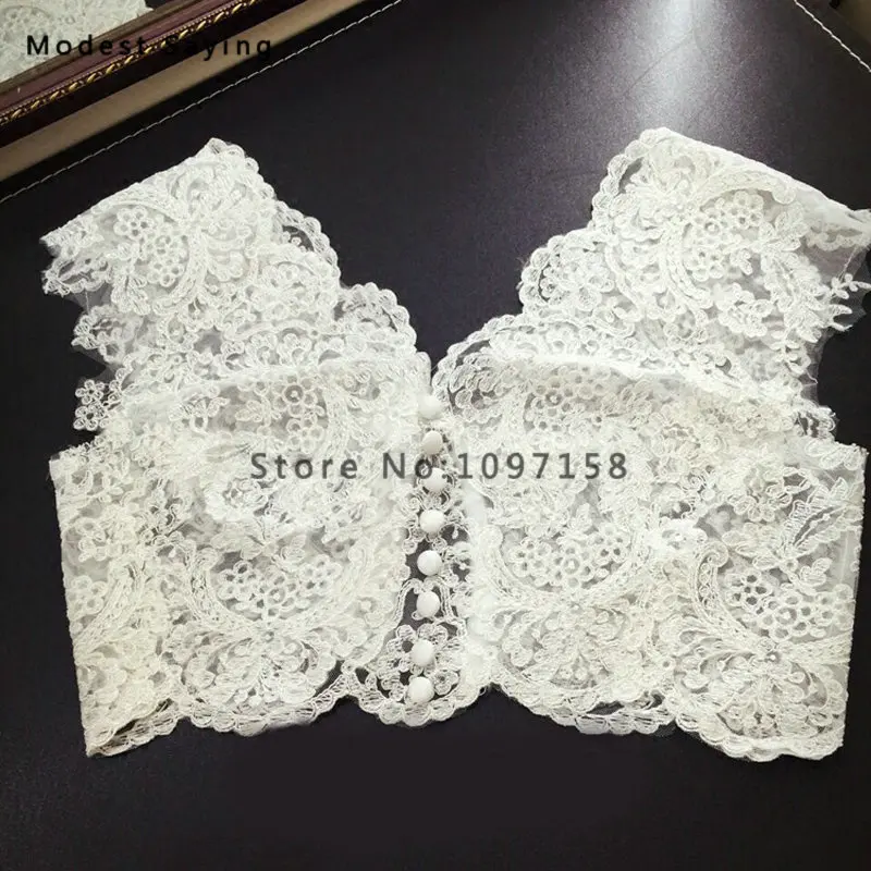 

Real Elegant Ivory Plunging Neck Lace Wedding Boleros 2018 Lace Up Back Women Bridal Capes Jackets Shawl Wedding Accessories