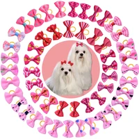 100pcs dog grooming bows pink red rose pink cat pet hair bows princess girls hair accessories pet dog bowknot rubber bands