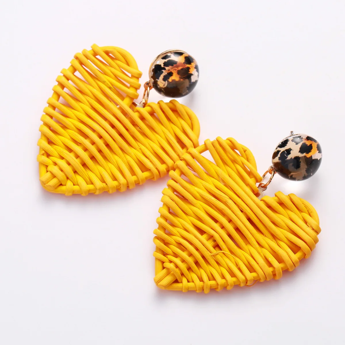 Женские плетеные серьги подвески в богемном стиле с сердечками эффектные