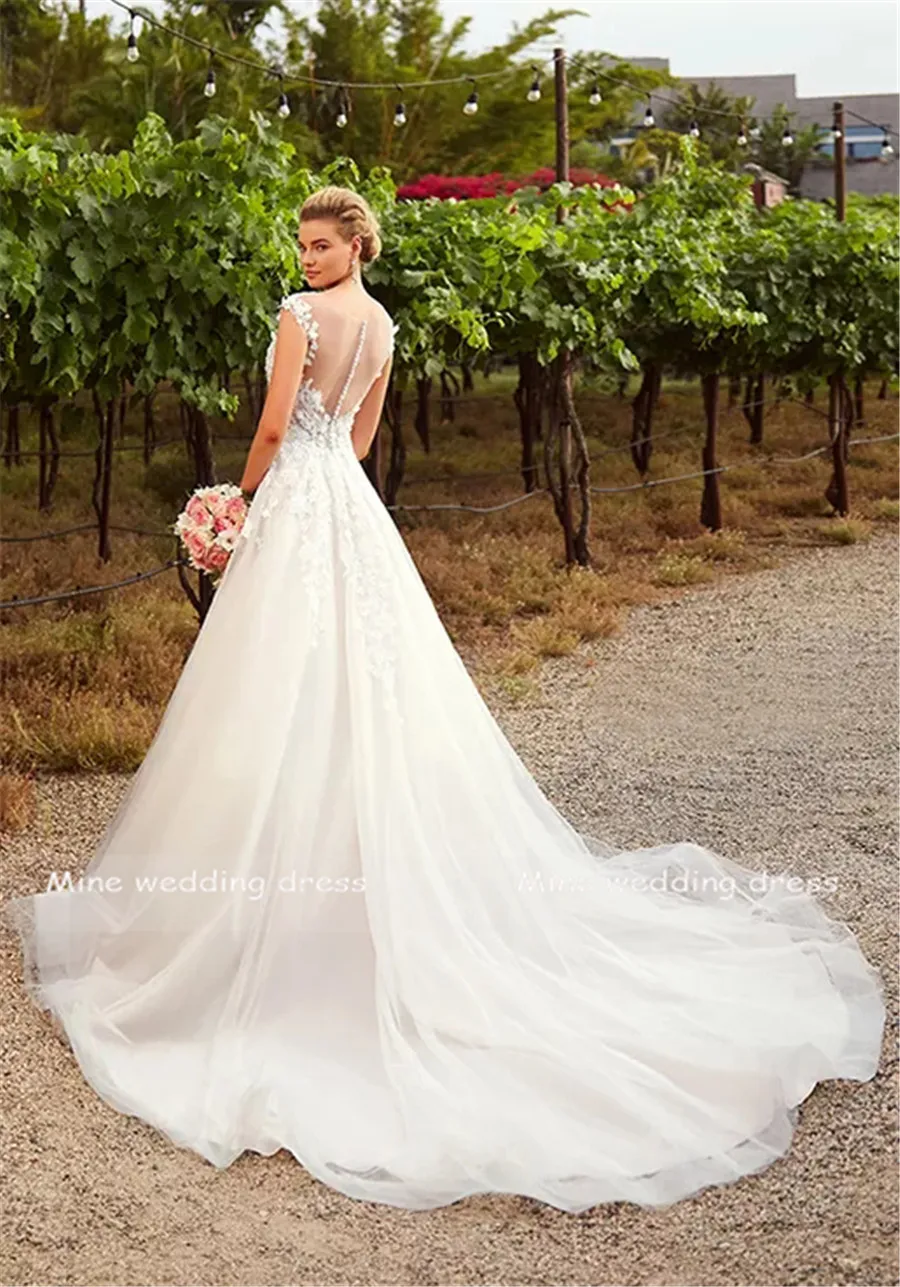 

Beautiful Lace a-Line With Stunning 3-Dimensional Flowers Wedding Dress With Detachable Long Sleeves See Through Bridal Dresses