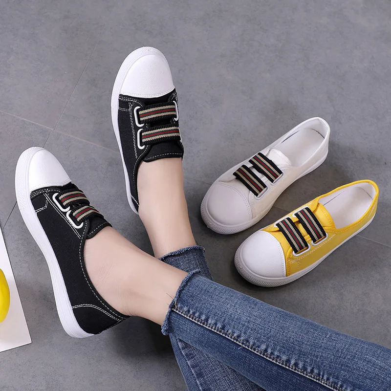 Женские парусиновые кроссовки повседневные белого цвета на плоской подошве в