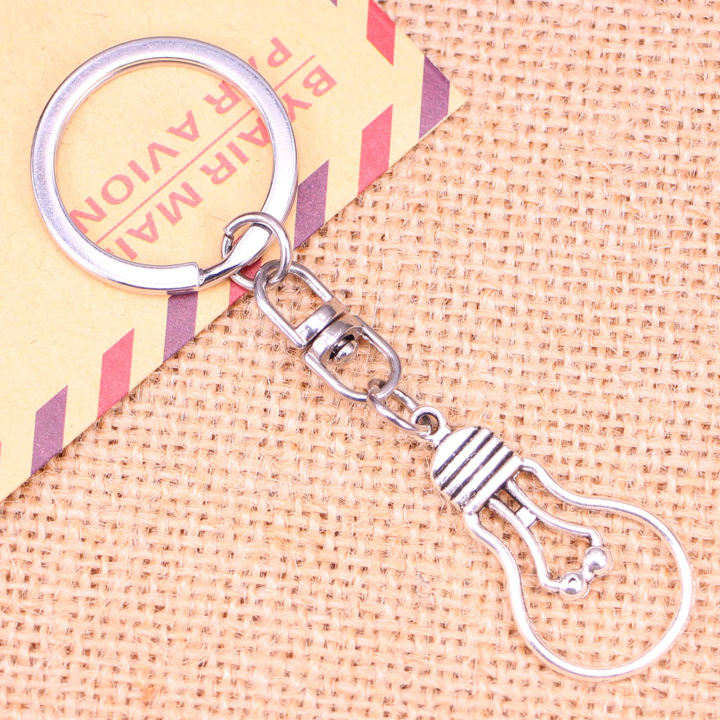 20pcs New Fashion Keychain 19*35 mm light bulb Pendants DIY Men Jewelry Car Key Chain Ring Holder Souvenir For Gift
