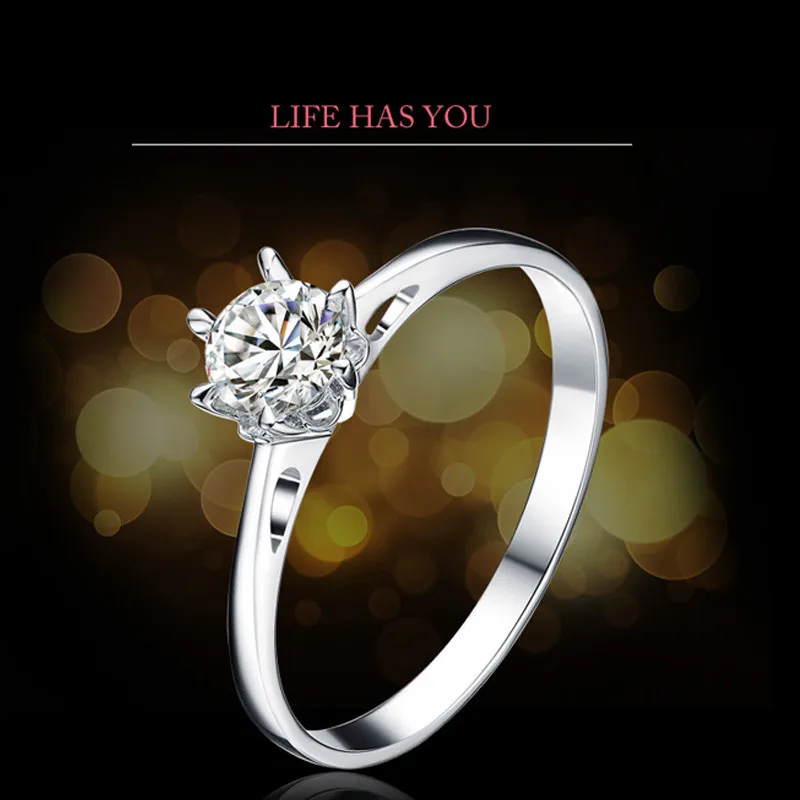 Женское кольцо с натуральным бриллиантом диаметром 0 3 карата