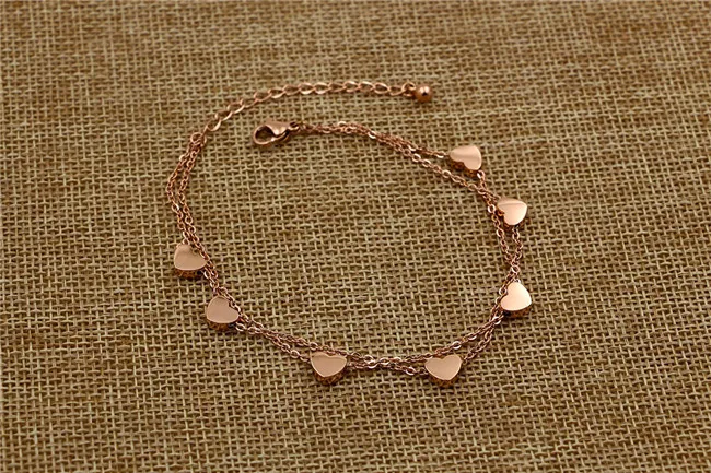 Женский браслет из нержавеющей стали Martick золотистого цвета с 7 сердечками 316L