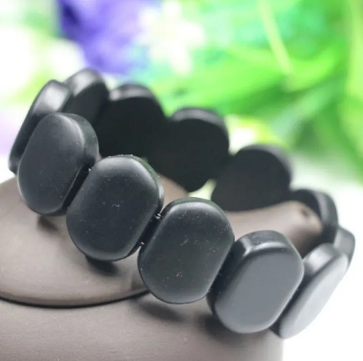 

Free shipping 100% Natural Energy Stone/ Magic Health Bracelet /Black / improve sleep and reduce blood pressure