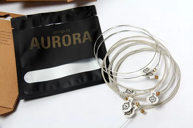 Струны для бас-гитары Aurora Premium ed разноцветные серебряного покрытия искусственный