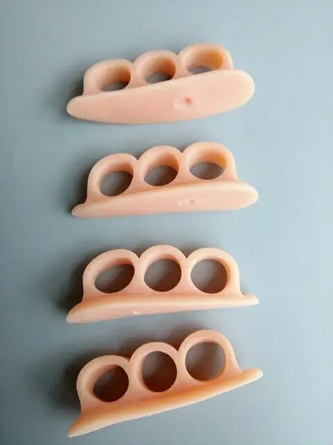 Силиконовый разделитель для пальцев ног при вальгусной деформации большого