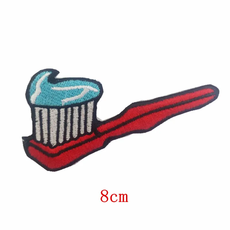 

A red toothbrush with toothpaste Embroidered iron on patch