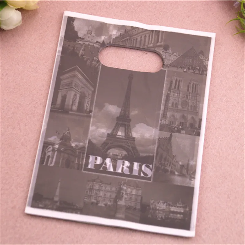 

New Design Wholesale 100pcs/lot 13*18cm Luxury Fashion Paris Eiffel Tower Gift Shopping Bags Plastic Gift Packaging
