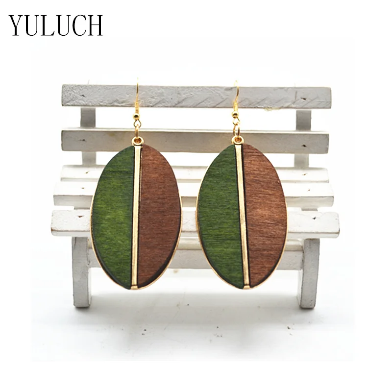 Женские деревянные серьги полукруглые минималистичные в форме листьев |
