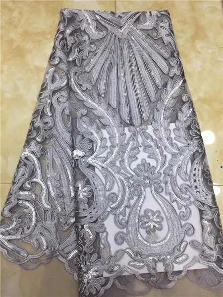 

The new design of Nigeria tulle sequins embroidery fabrics, with beautiful French Christmas dress fabrics