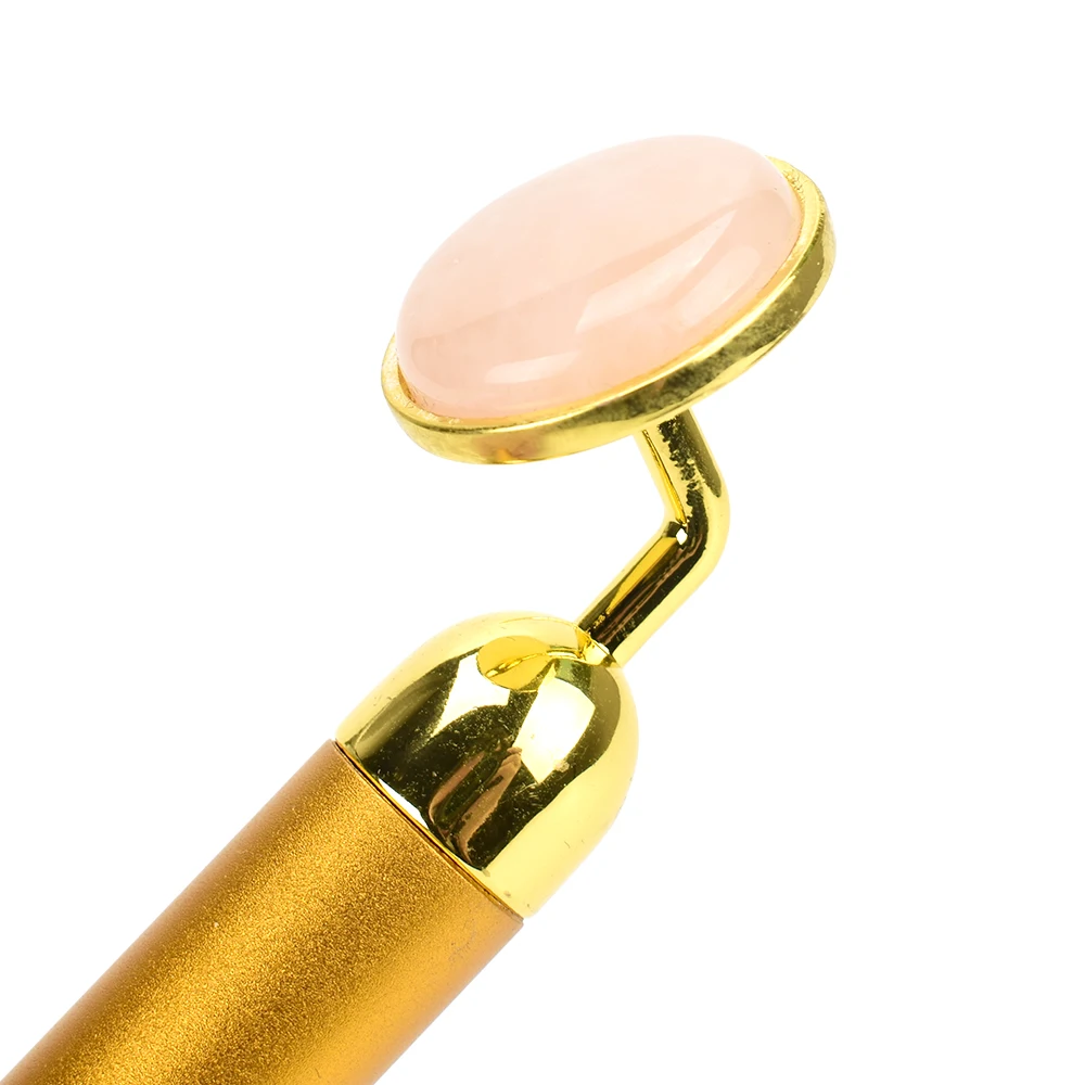 Электрический массажер золотого цвета с вибрацией Нефритового валика и розовой