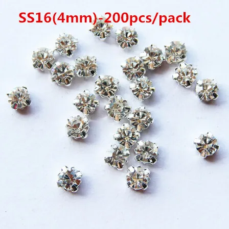 Стразы стеклянные в виде камней серебристые с прозрачными кристаллами пришивные