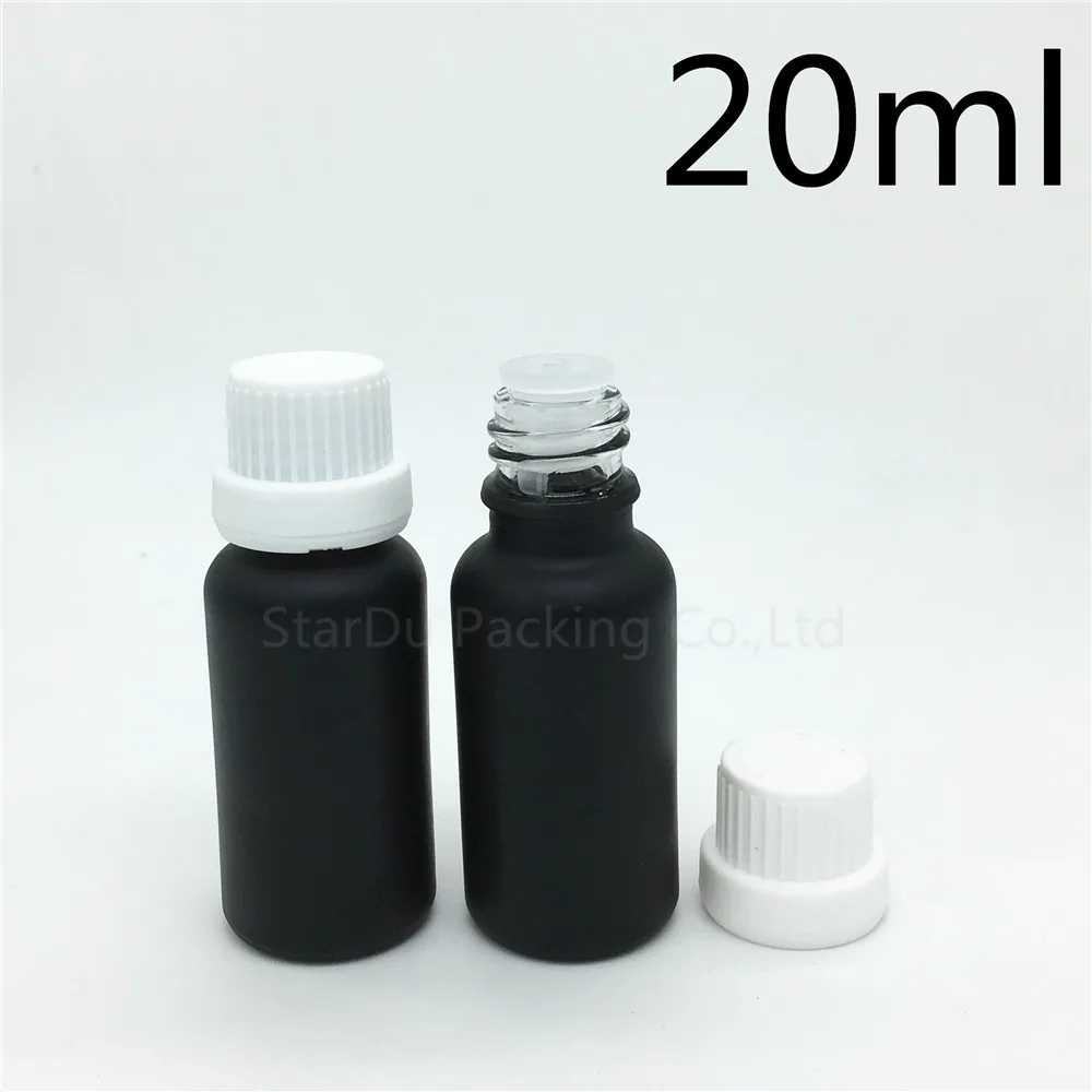 

Free Shipping 200pcs 20ML Black Frosted Glass Bottle 20ml Vials Essential Oil Bottle White Tamper Evident Cap Perfume Bottle