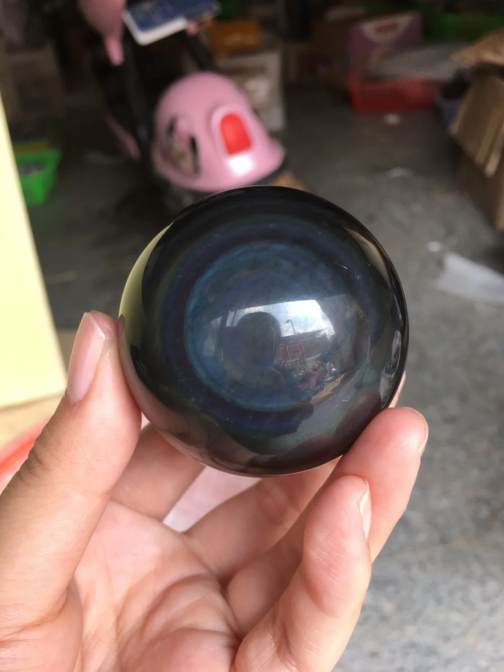 

A naturally beautiful colored obsidian ball