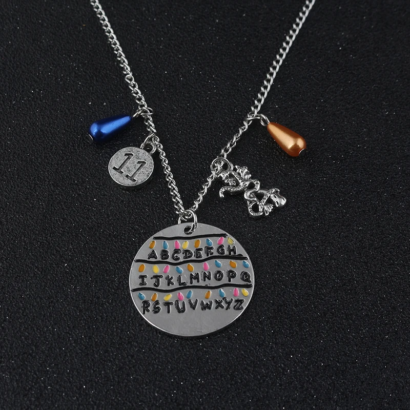 Очень странные дела ожерелье с подвеской в виде Светильник лампы бусины Handstamped