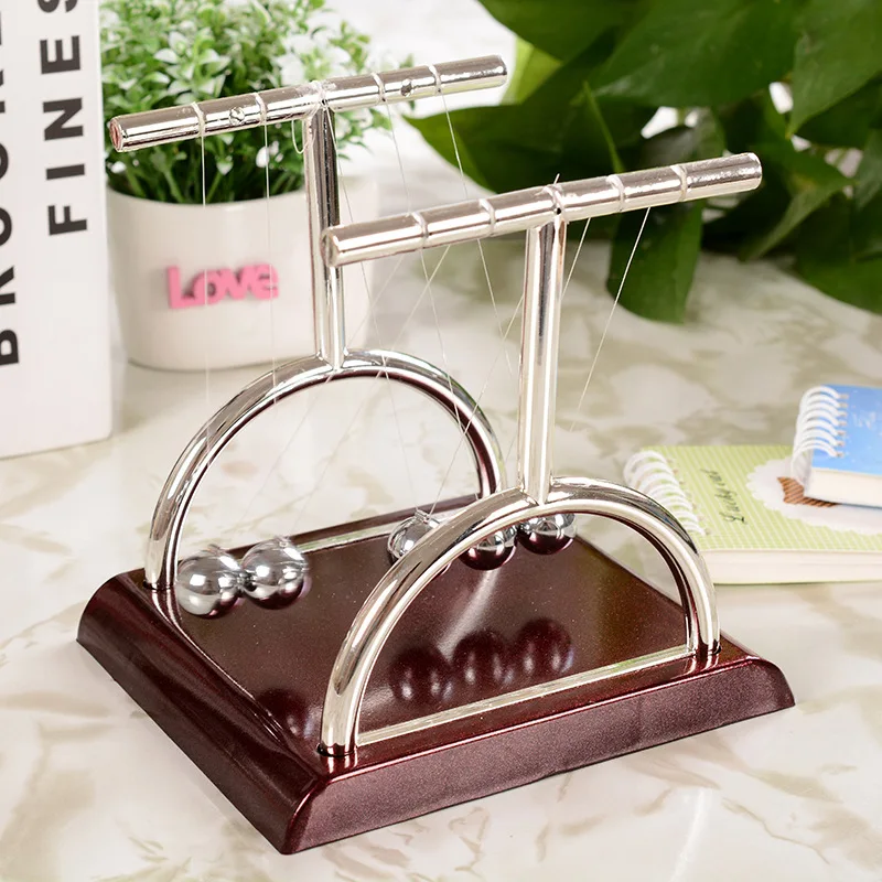 Физика маятниковый баланс удар мяча эксперимент Колыбель Ньютона биллиардный