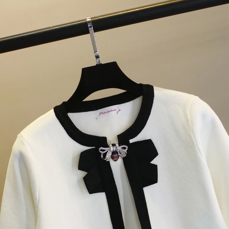 sweet wind cardigan coat female 2018 new round collar bowknot temperament long sleeve short wool sweater not with bee brooch |