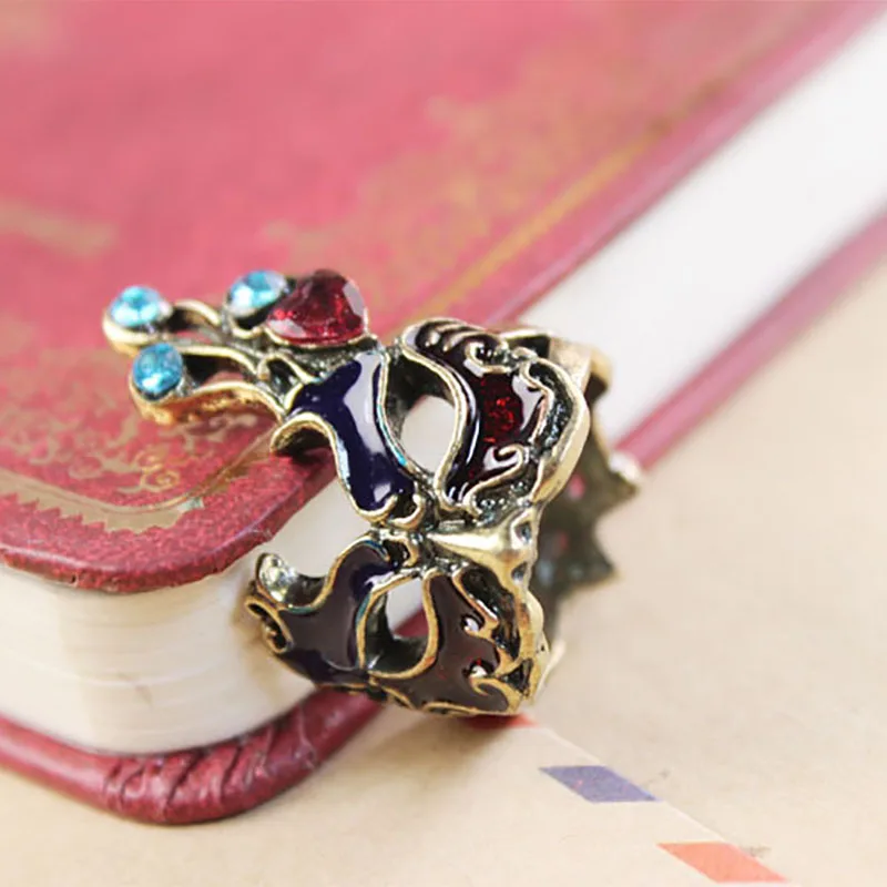 Кольца в виде маски с кристаллами антизолотое кольцо средней длины на костяшки