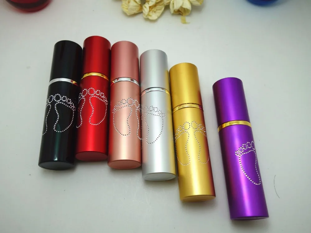 

Wholesale L71-10ML Foot Pattern Drilling Aluminum Perfume Glass Spray Bottle 108PCS/LOT