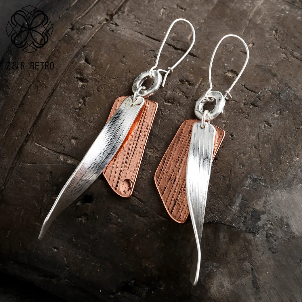 Серьги подвески женские из розового золота ювелирное изделие в форме капли